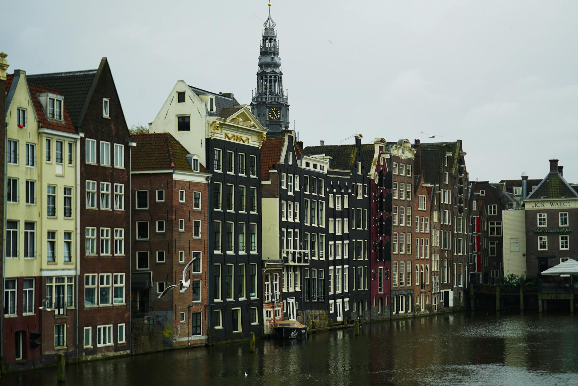 The Amsterdam canal belt with historic merchant houses lining the water