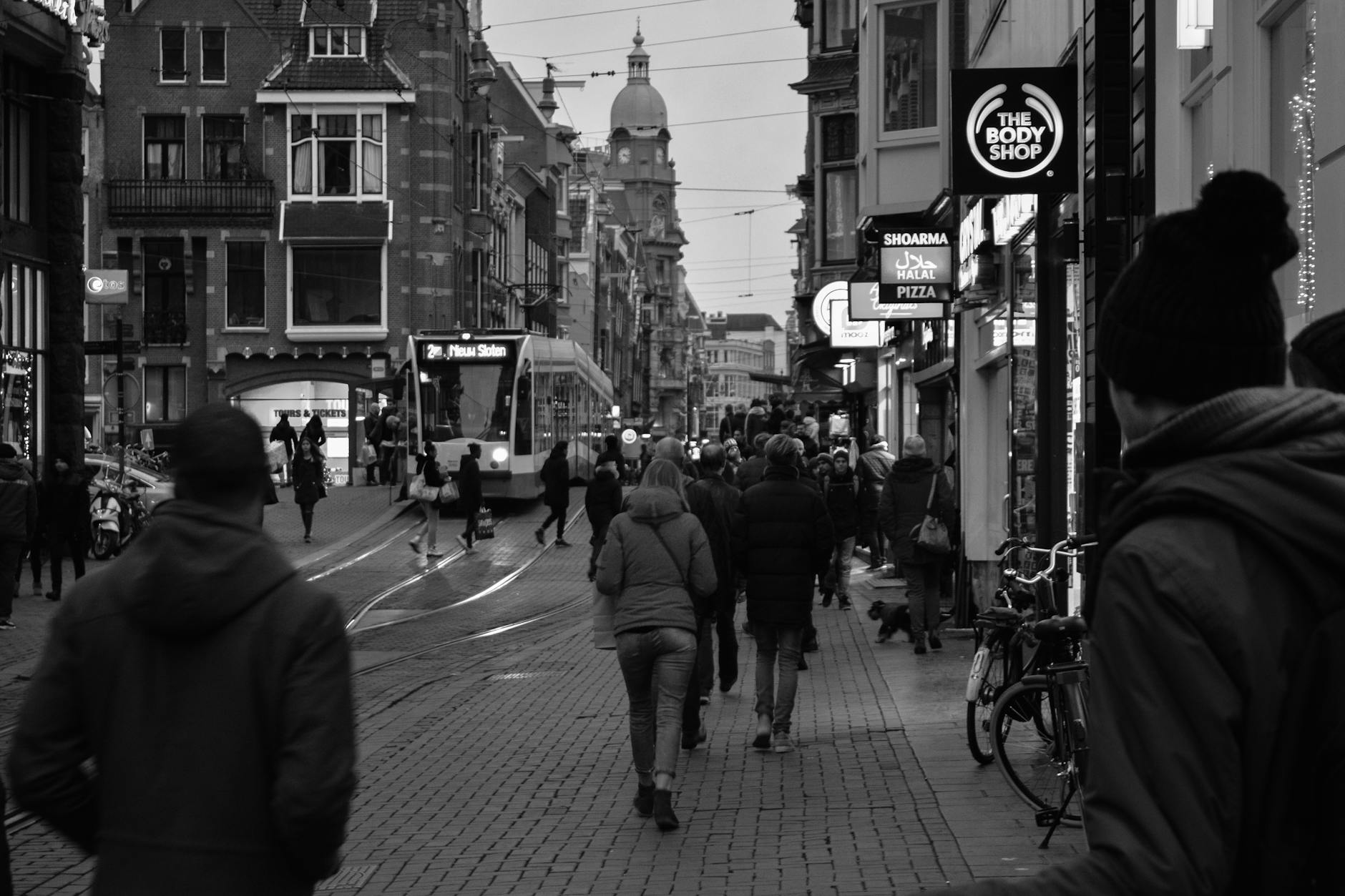 A busy street scene in central Amsterdam near Central Station