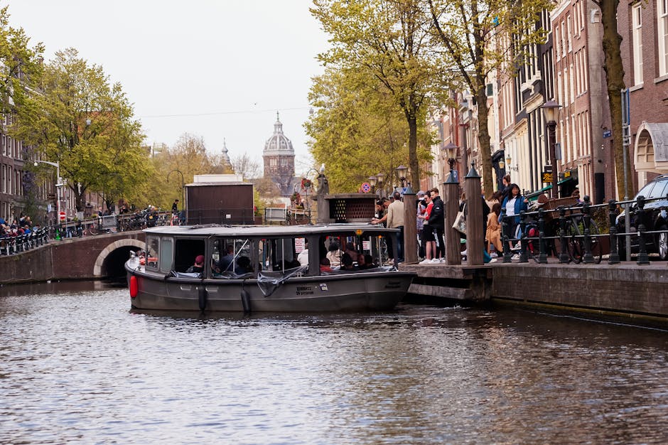 Amsterdam canal cruise dusk evening lights
