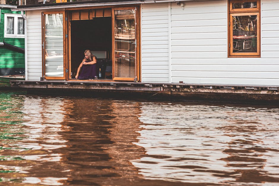 Dutch houseboat bedroom canal window