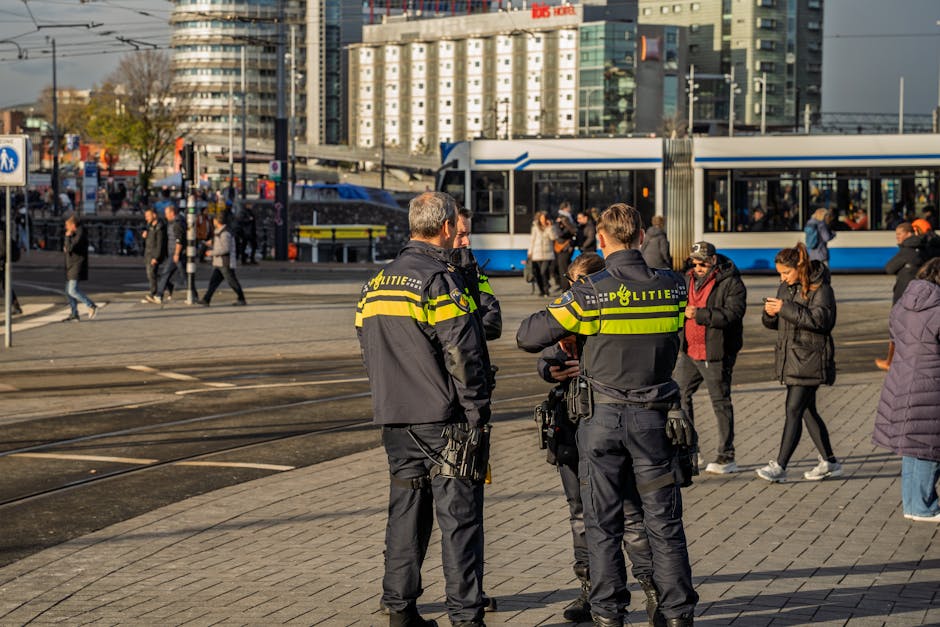 Amsterdam canal bridge crowd respecting rules