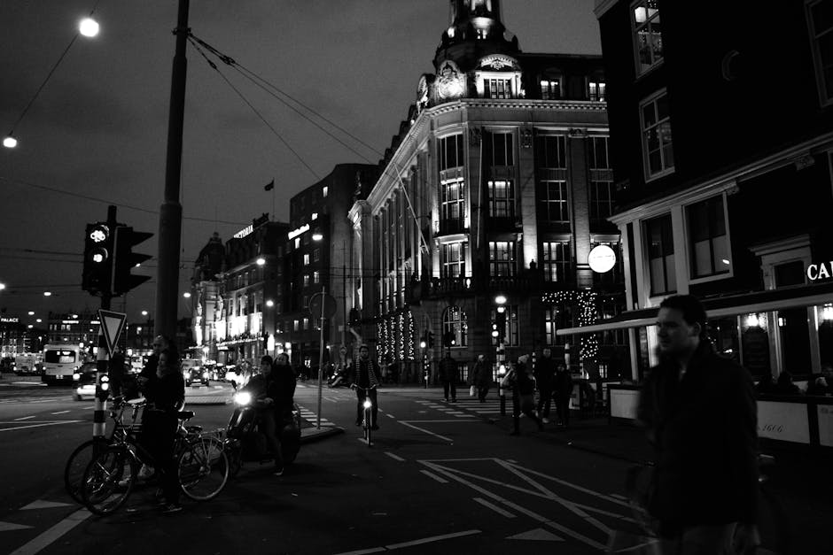 Amsterdam canal at night with safe well-lit streets