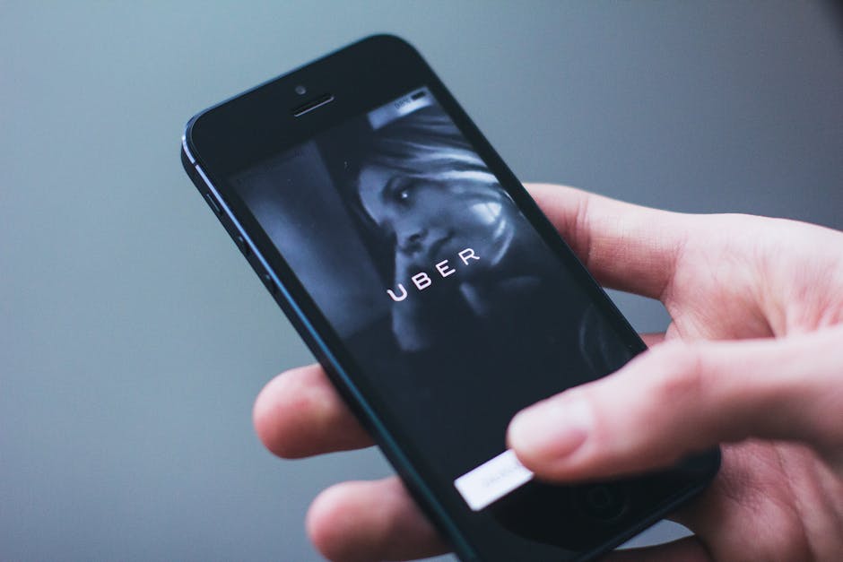 Uber app phone car ride passenger
