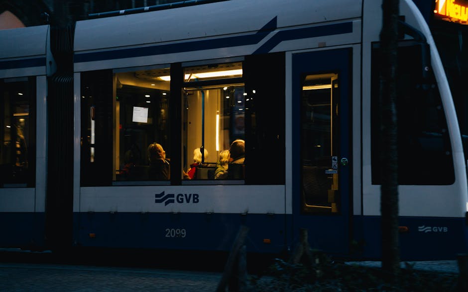 Amsterdam tram interior passengers commuting