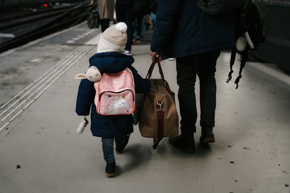 Amsterdam tourist family travel suitcase