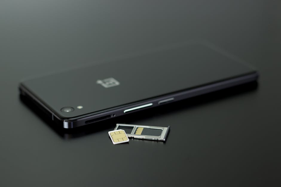 SIM card mobile phone setup hand close