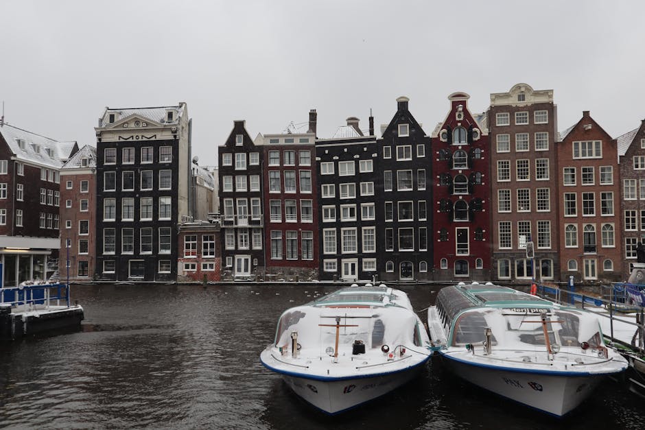 Amsterdam canal winter night lights reflection