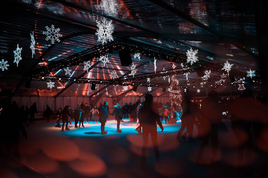 Ice skating rink Christmas lights people rink
