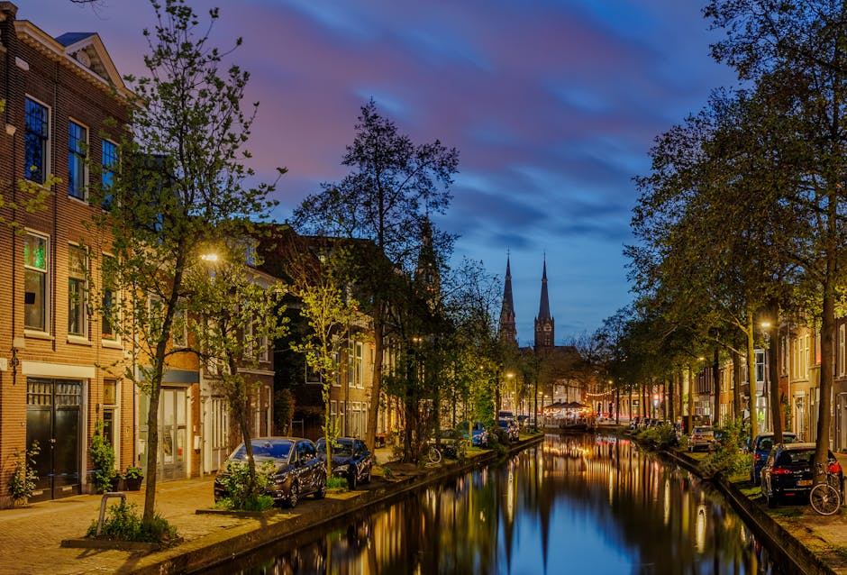 Delft Netherlands canal historic town houses