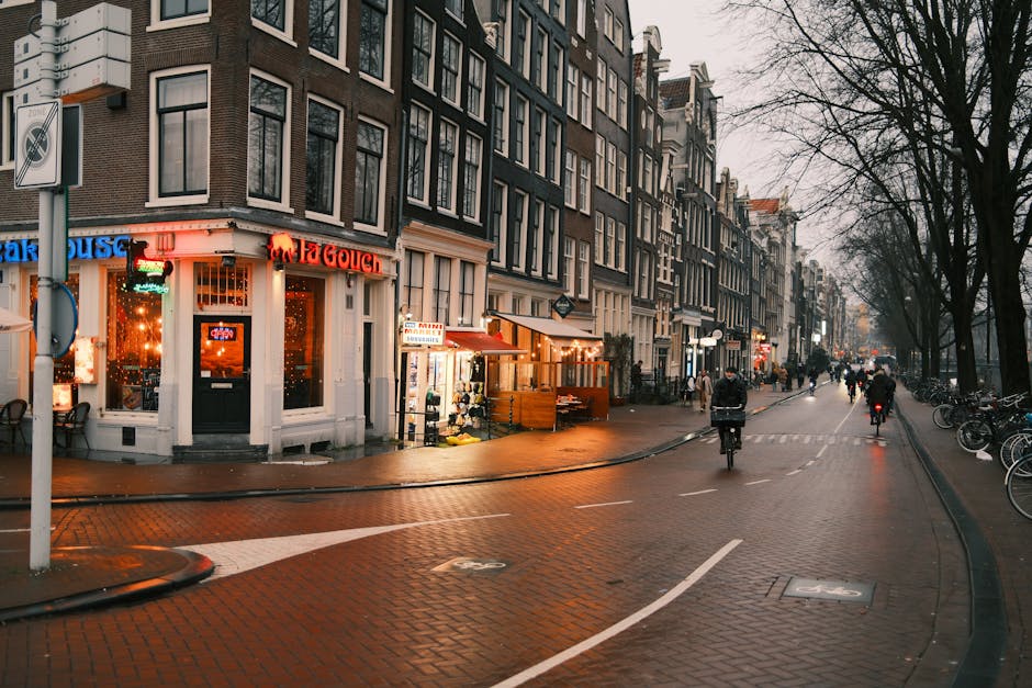 Amsterdam bike lane red street cyclist warning
