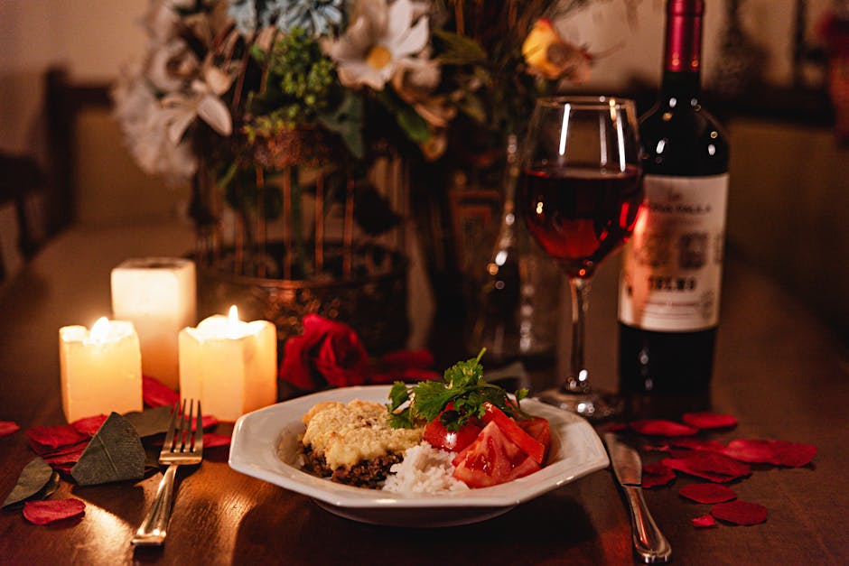 Romantic candle-lit dinner table for two restaurant