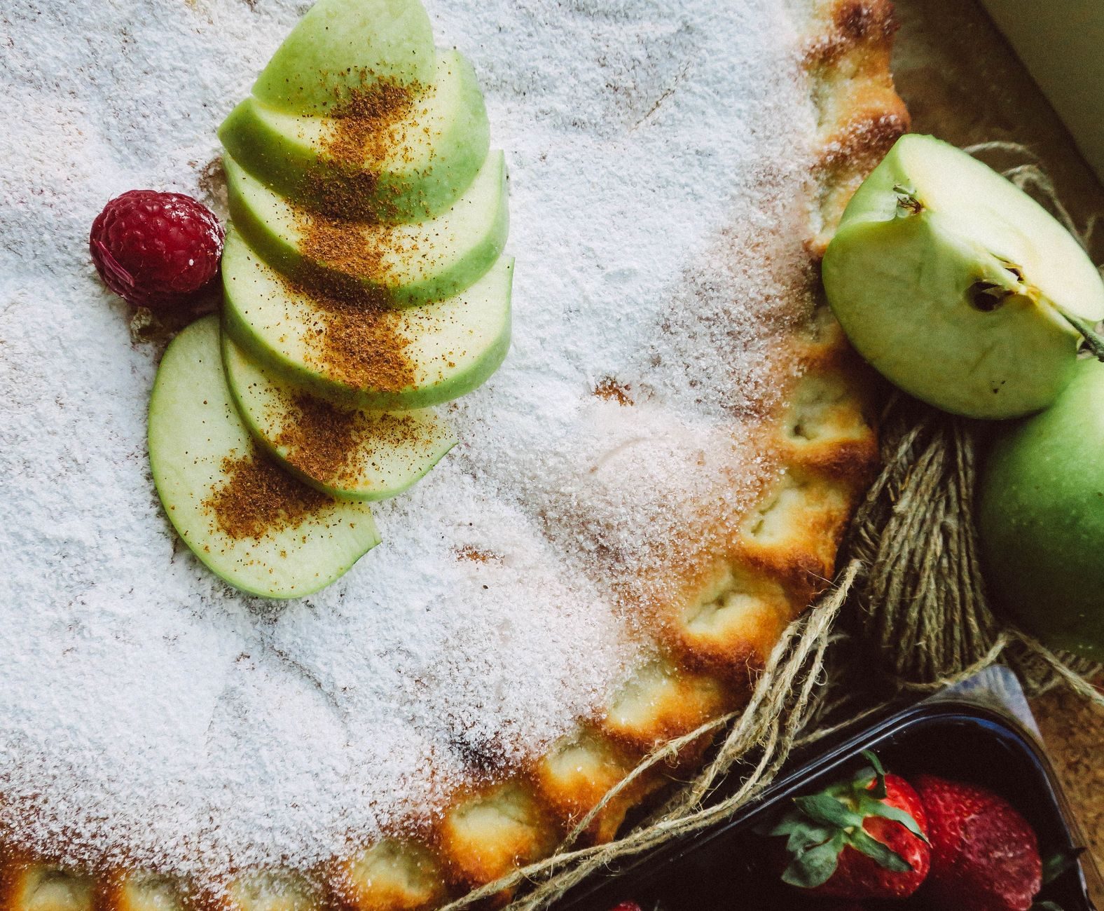 Traditional Dutch apple pie with whipped cream at an Amsterdam cafe
