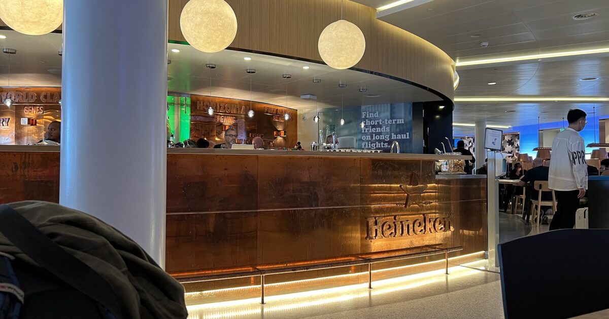 The copper Heineken bar inside the KLM Crown Lounge in the non-Schengen zone at Schiphol