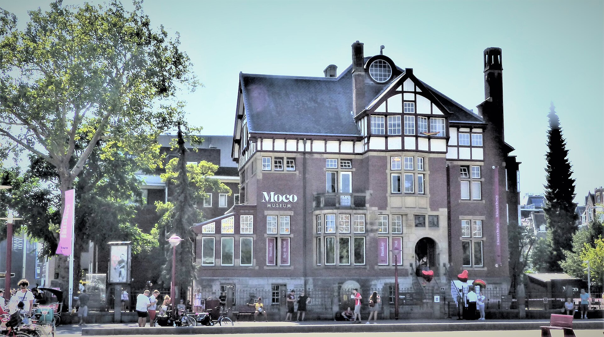 The Moco Museum in Villa Alsberg on Museumplein with Banksy banners outside
