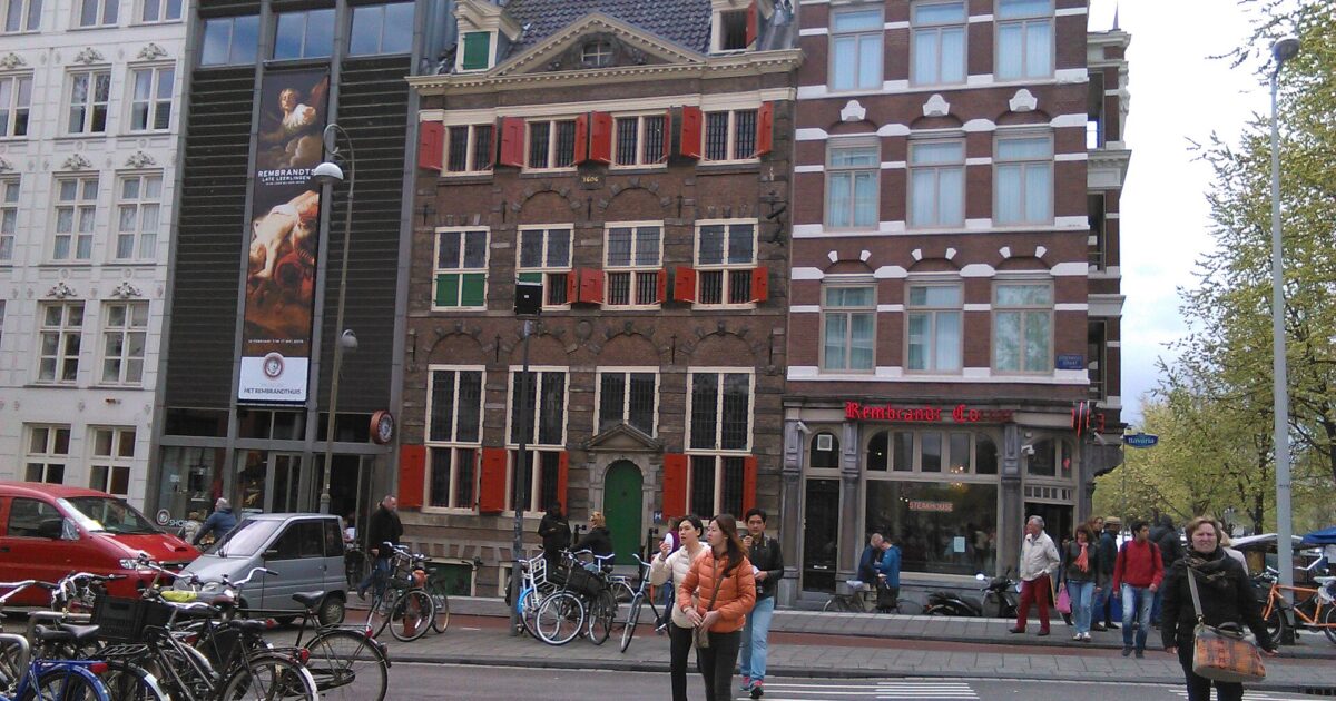 The Rembrandt House on Jodenbreestraat in Amsterdam with red shutters