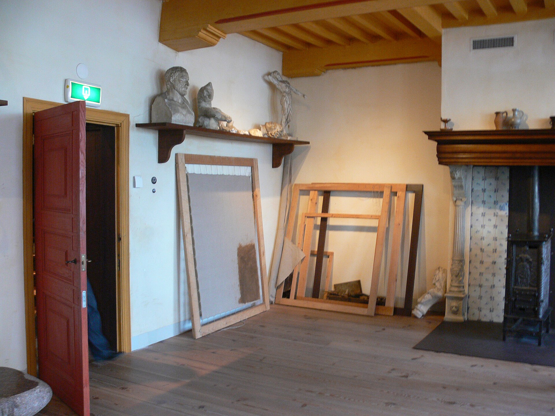 Rembrandt's reconstructed painting studio with stretchers and a fireplace
