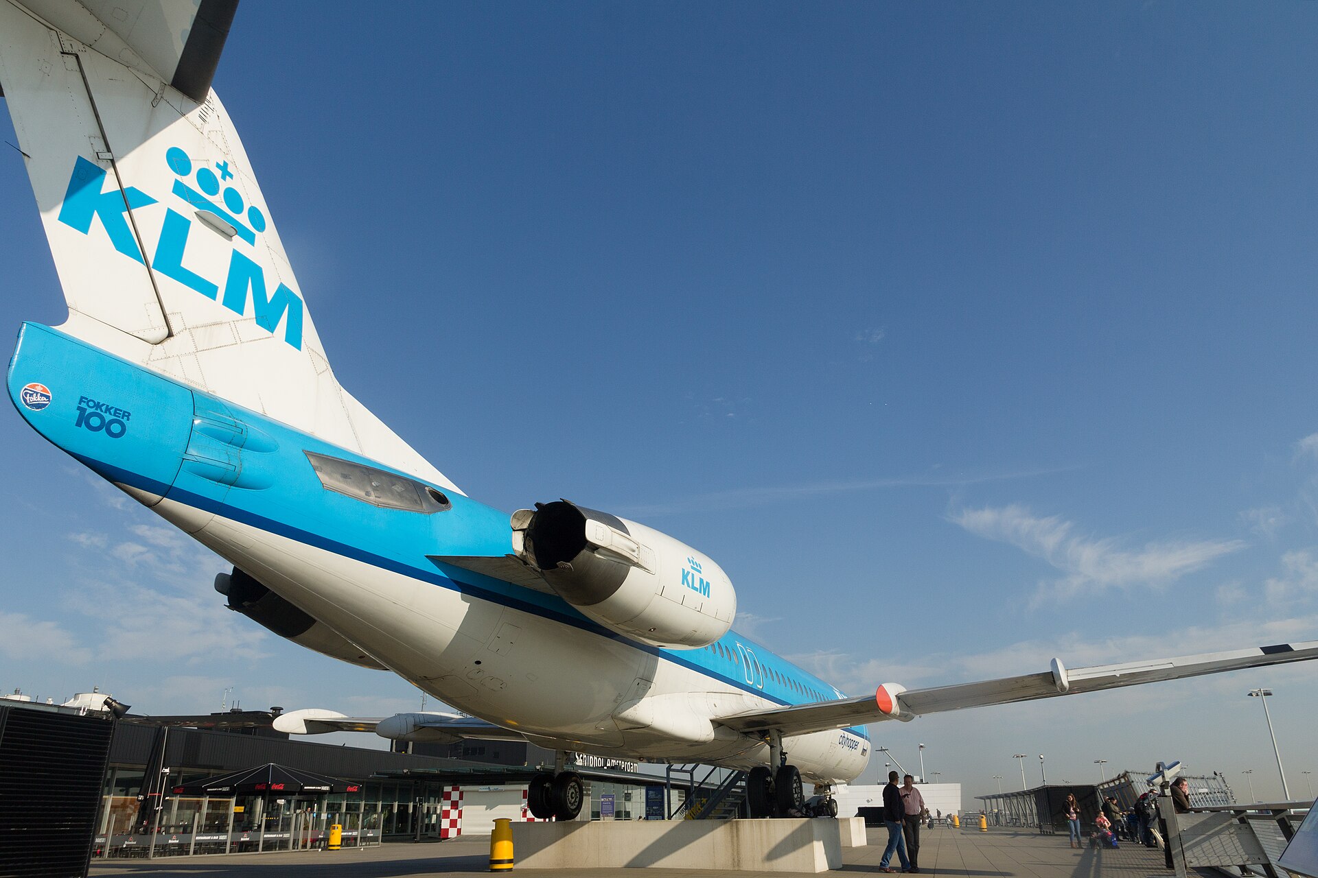 A retired KLM Fokker 100 parked on the Panorama Terrace at Schiphol